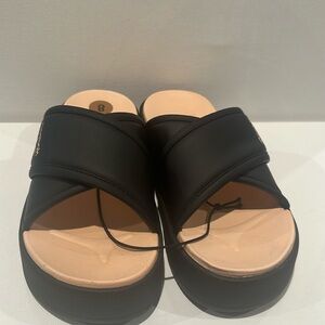 Reebok Cross Strap Slippers.